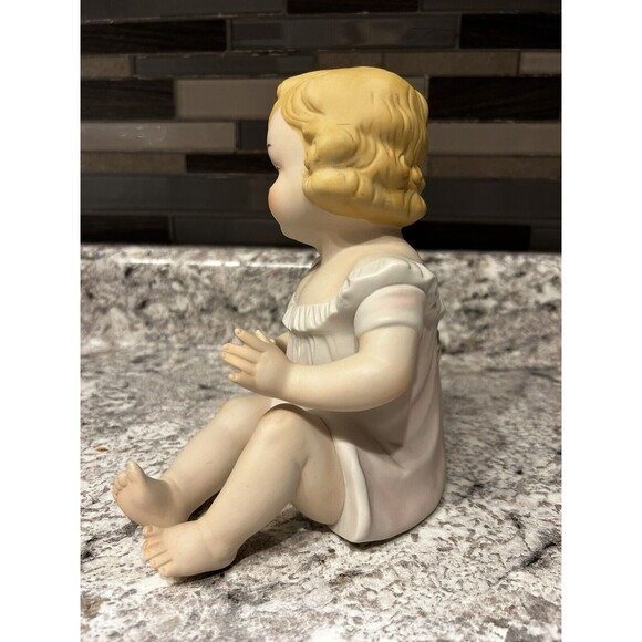 Vintage Porcelain Bisque Piano Baby 7” Blonde girl Sitting Pink Dress With Bow - Picture 4 of 4